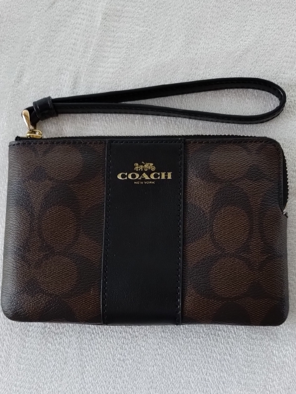 Like-New Coach Brown and Black Signature Wristlet with Gold Logo